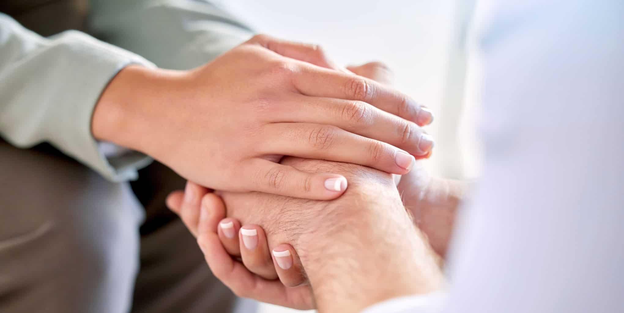 A therapist offers support to a client at a cognitive behavioral therapy in Boca Raton.