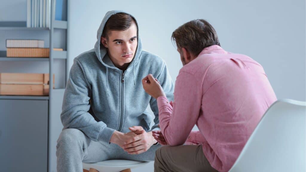 A young man receives therapeutic counseling during OCD treatment in Boca Raton.