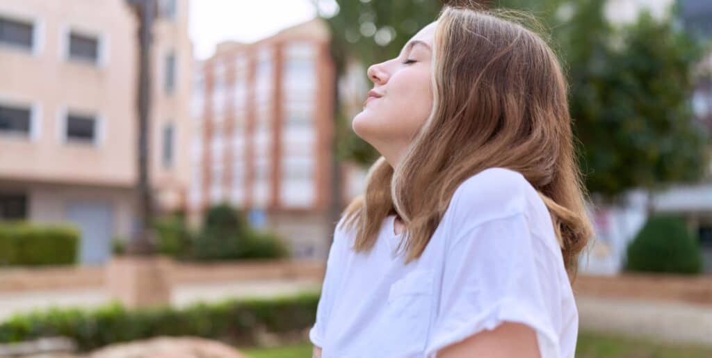 Woman feeling relaxed and at peace after CBT.