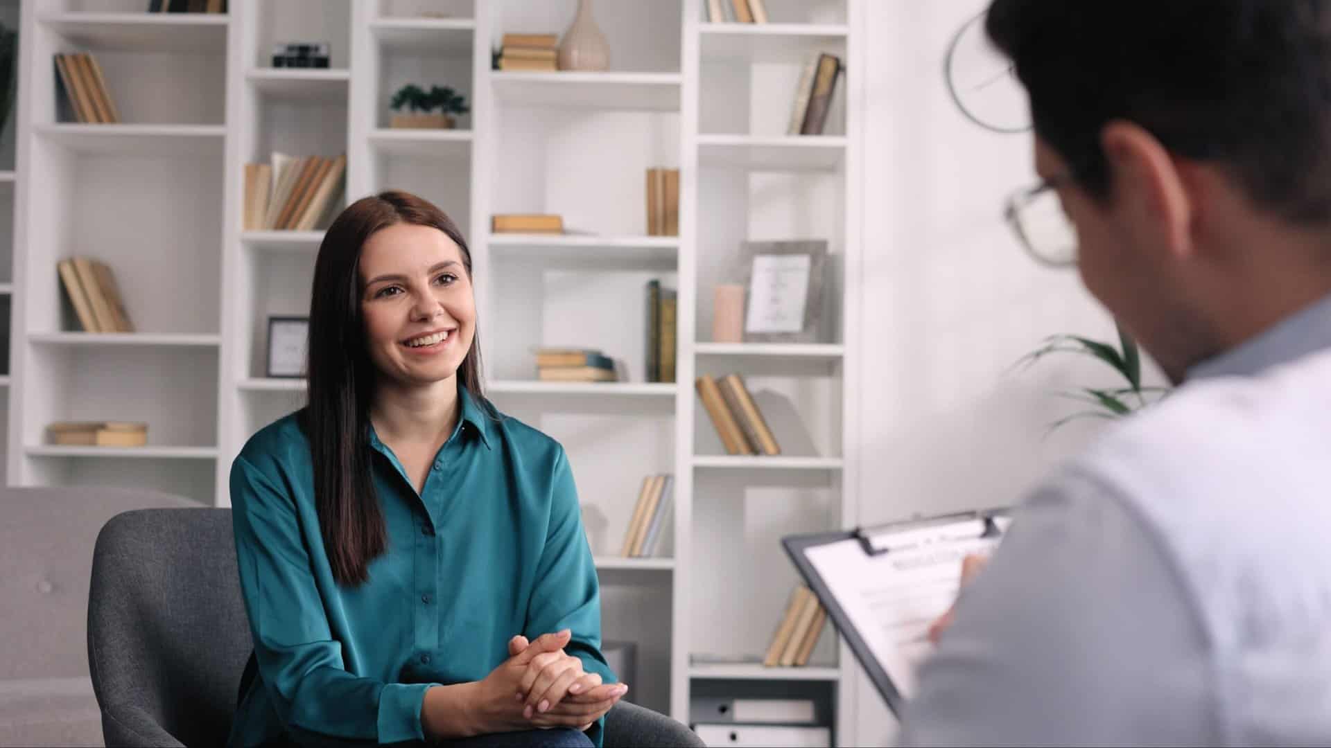 A woman receives professional support during OCD treatment in Boca Raton.