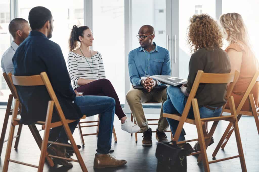 A group discussion during therapists business development services seminar.