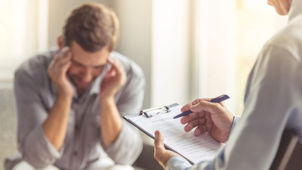 A man struggling with his mental health seeks a major depressive disorder treatment in Boca Raton.